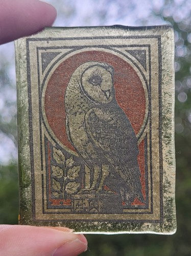 Stained glass owl piece window
